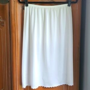 LORRAINE HALF SLIP, white 100 nylon large. Good used condition.